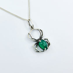 Collection of Glowing Green Onyx Spider Pendant in a gallery layout