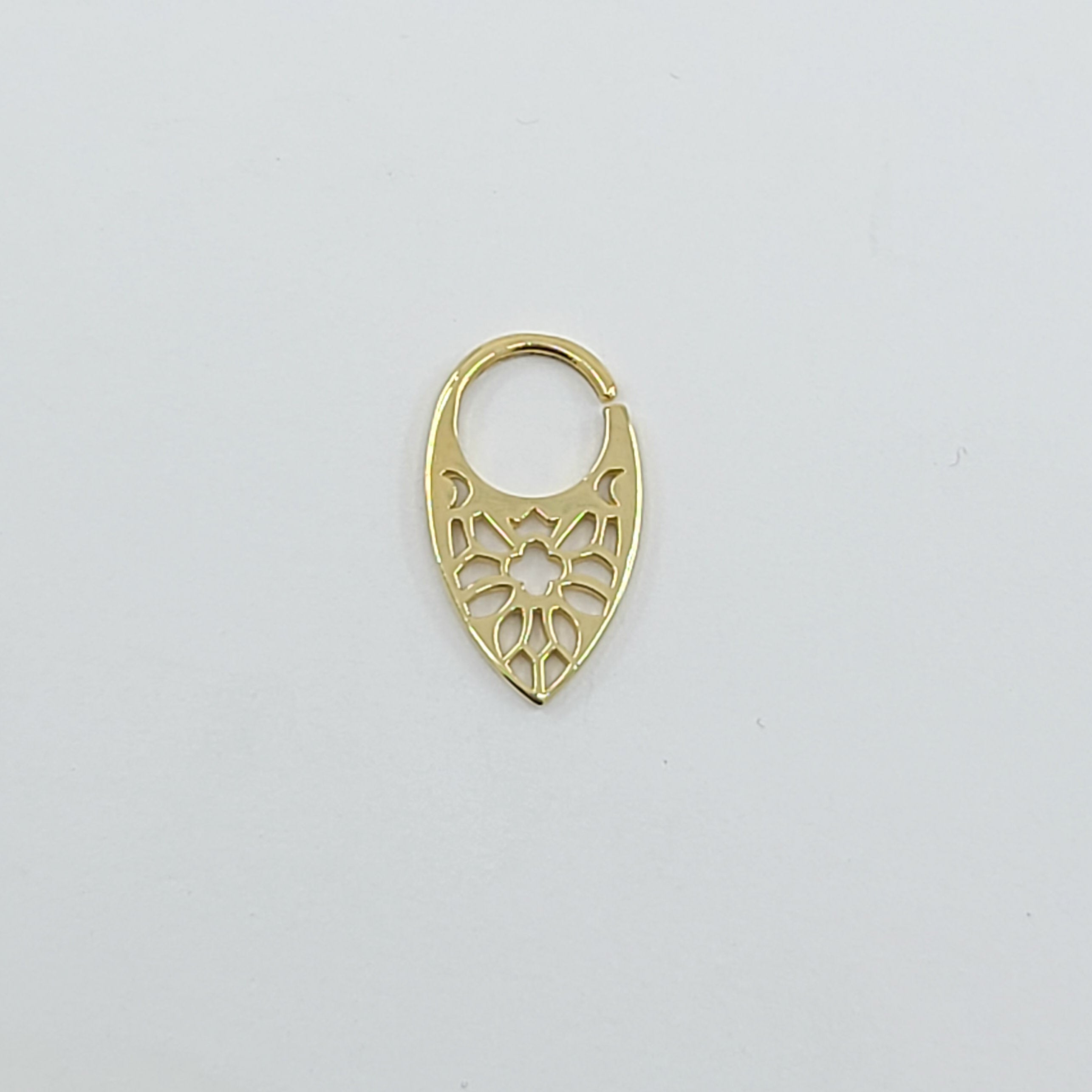 Collection of 10K Yellow Gold Moon Phase Septum, Cathedral in a gallery layout