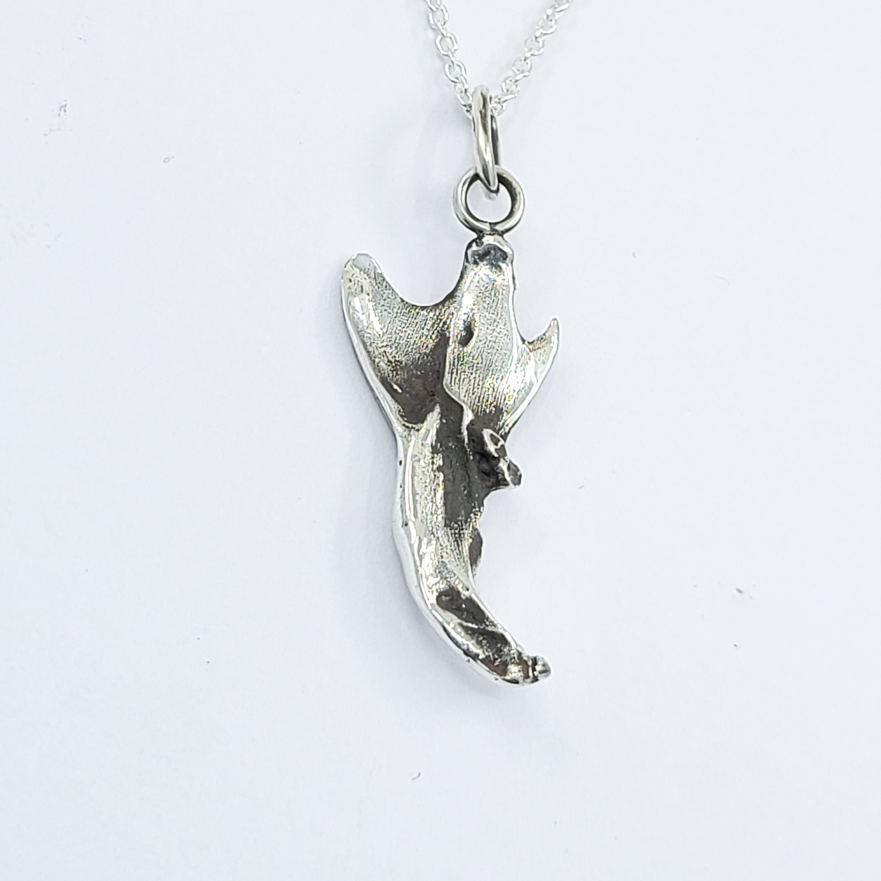 Collection of Small Squirrel Jaw Bone Pendant in a gallery layout