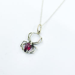 Collection of Radiant Red Garnet Cab Spider Pendant in a gallery layout