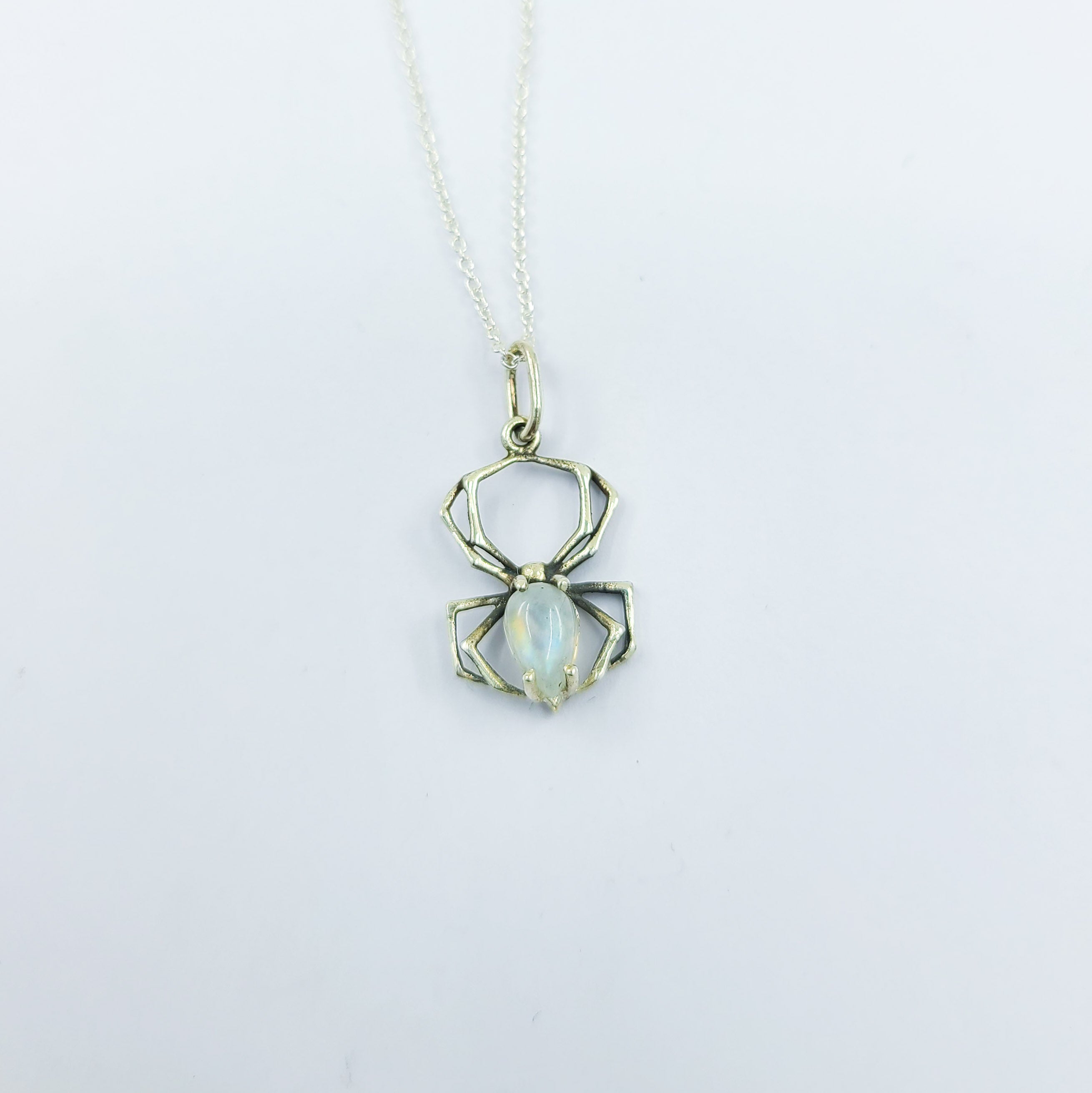 Collection of Rainbow Moonstone Spider Pendant in a gallery layout