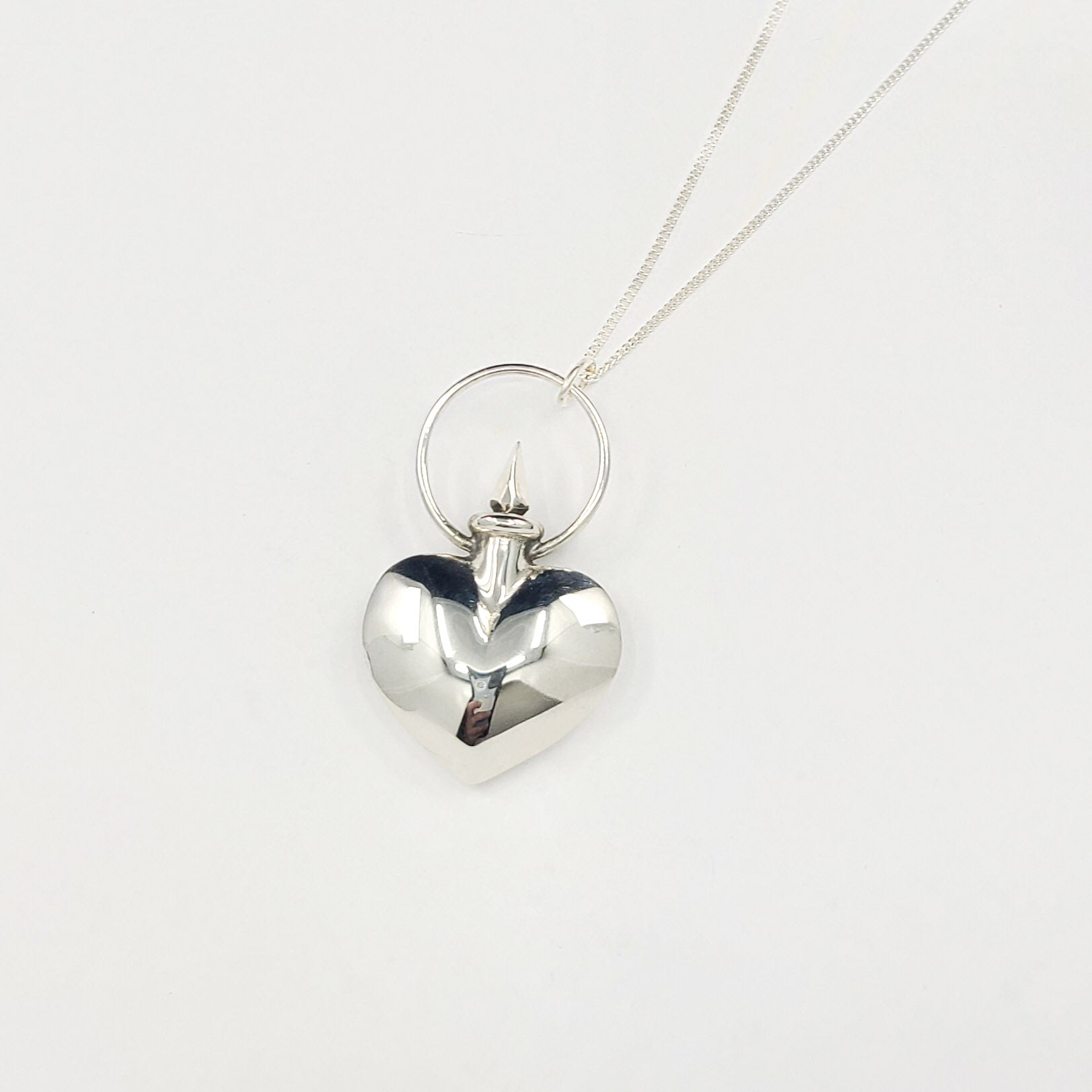 Collection of Silver Heart Urn Vial Pendant in a gallery layout