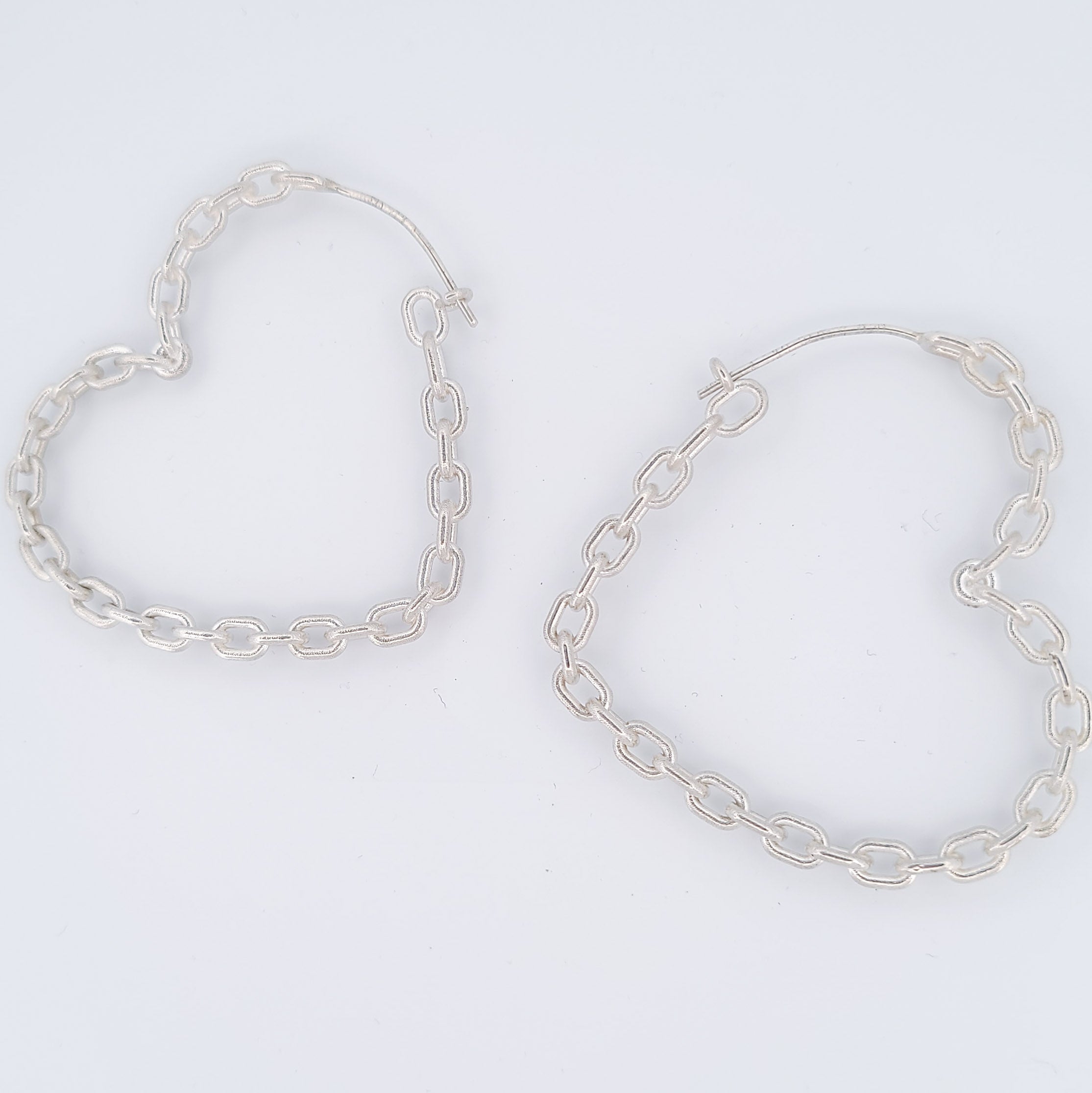 Collection of Big Heart Chain Hoops in a gallery layout