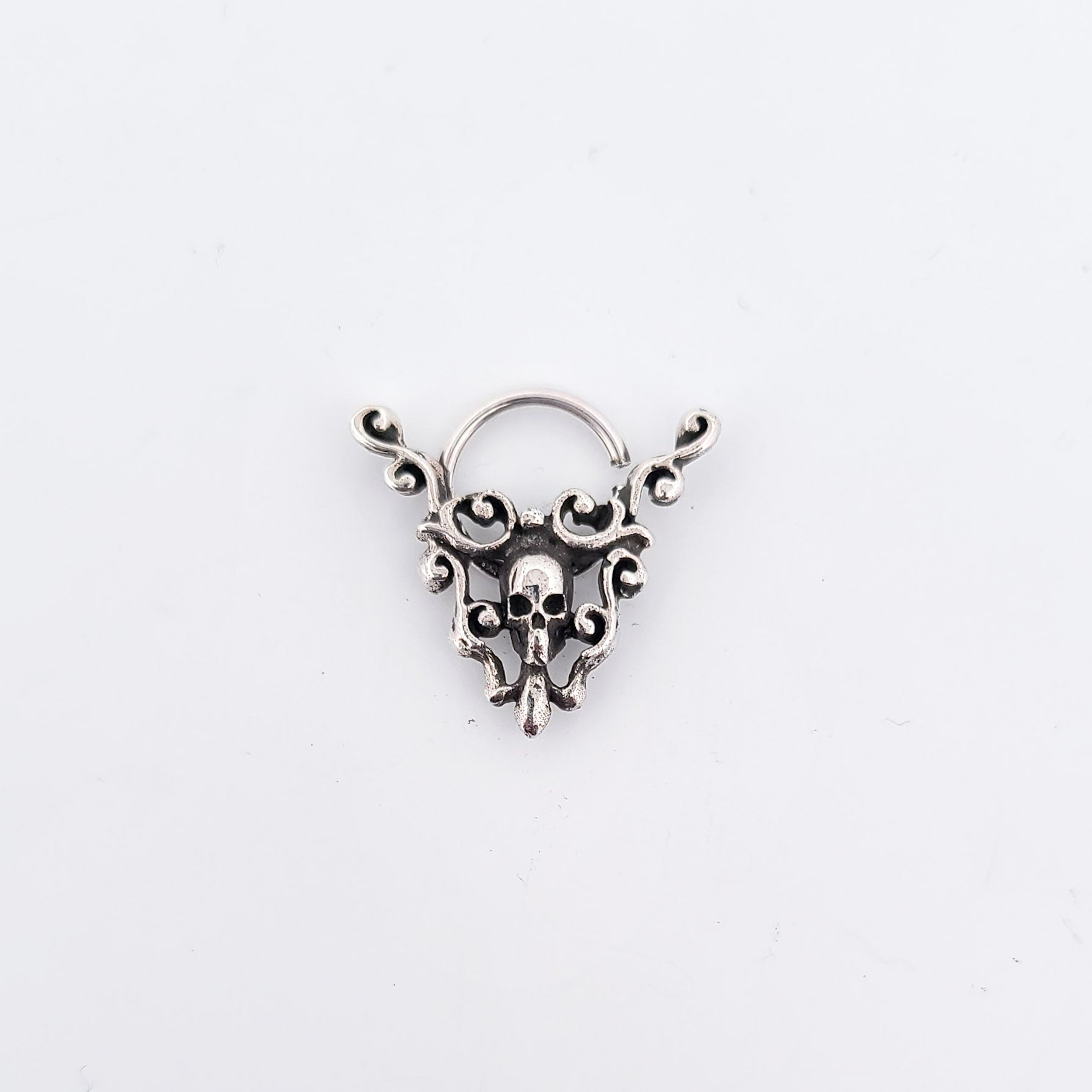 Collection of Skull and Lace Septum Piercing in a gallery layout