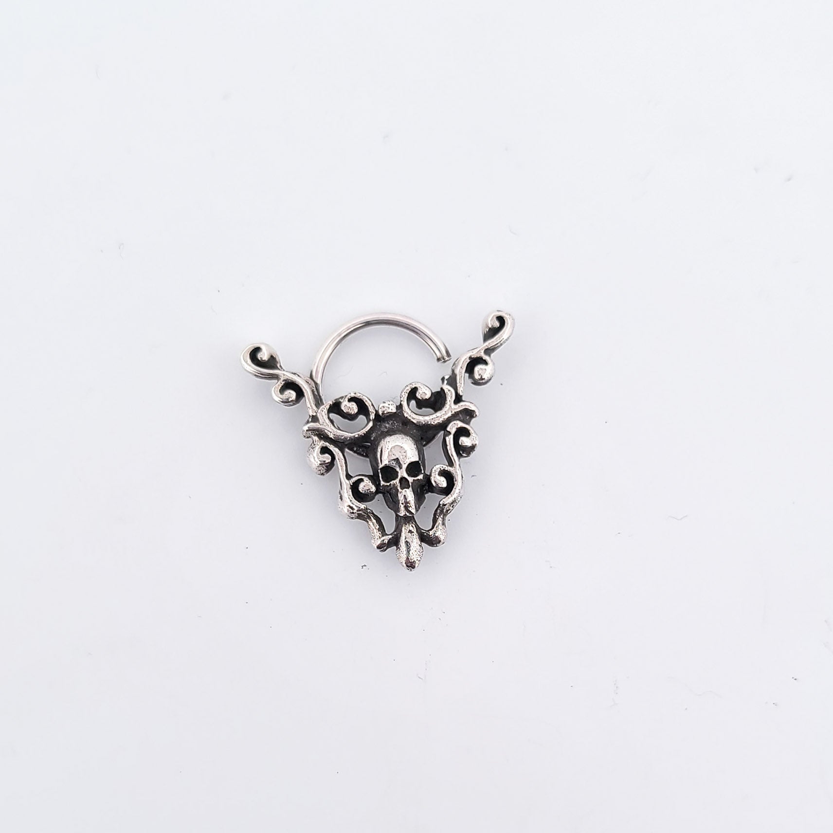 Collection of Skull and Lace Septum Piercing in a gallery layout