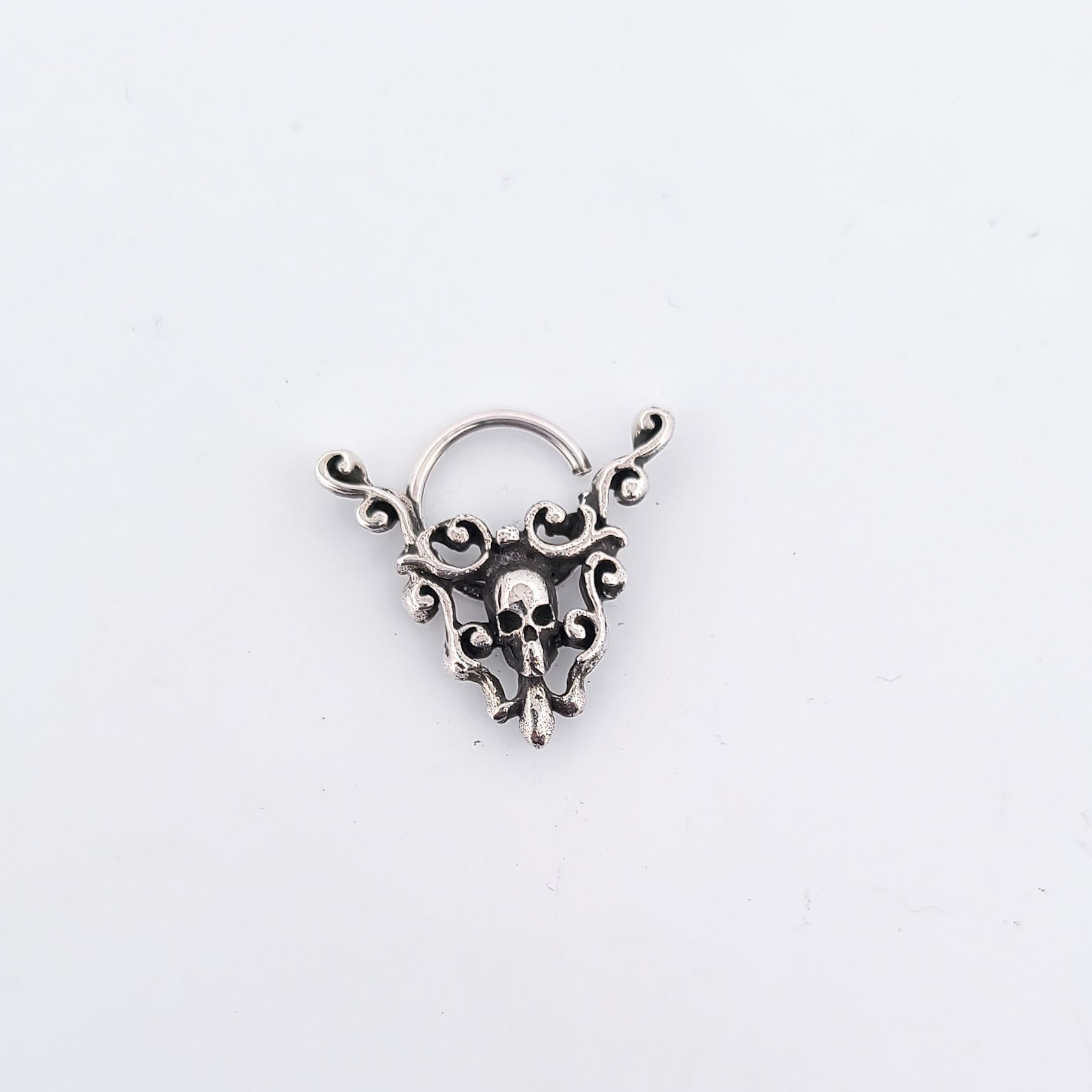 Skull and Lace Septum Piercing