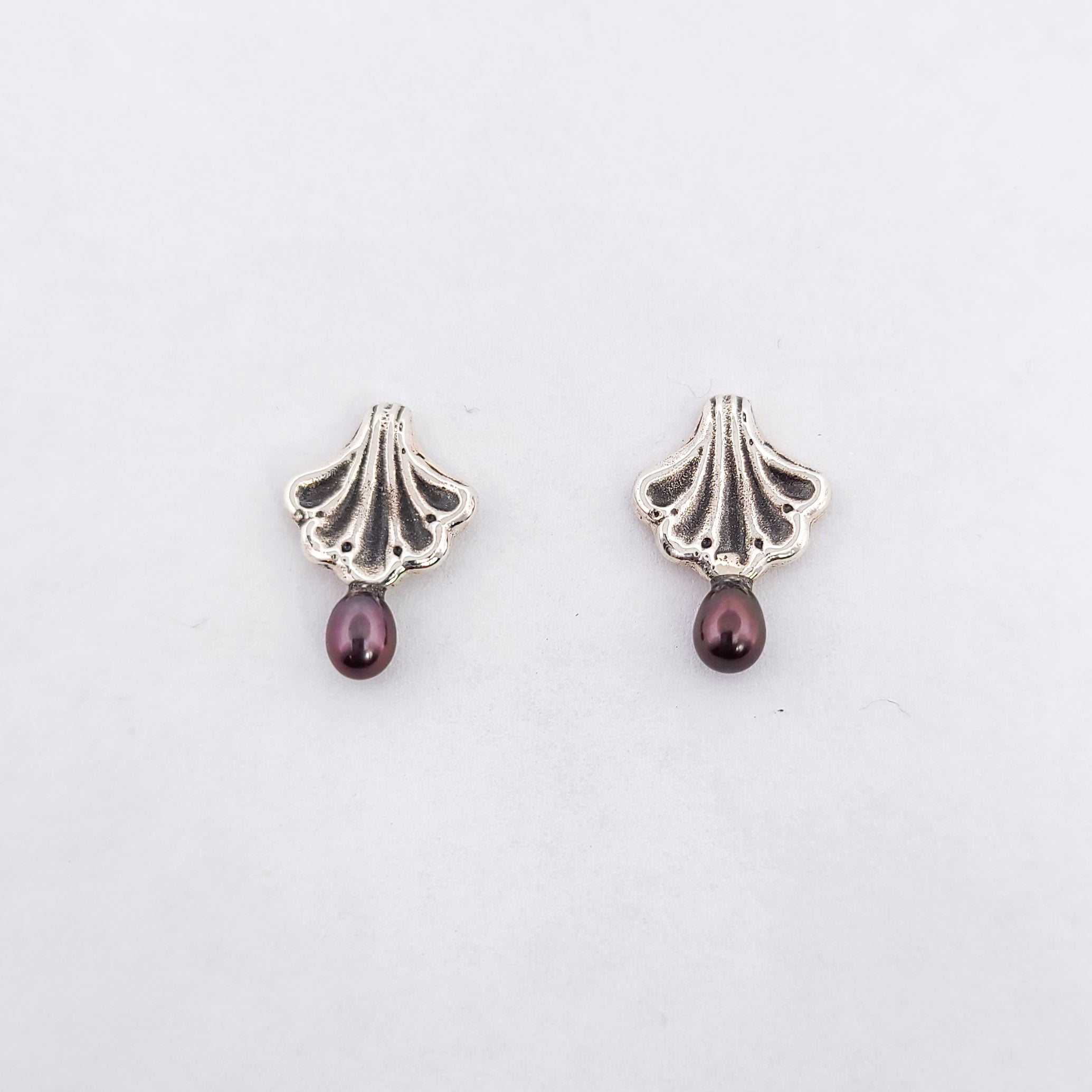 Ornate Seashell Earrings with Dark Pearls