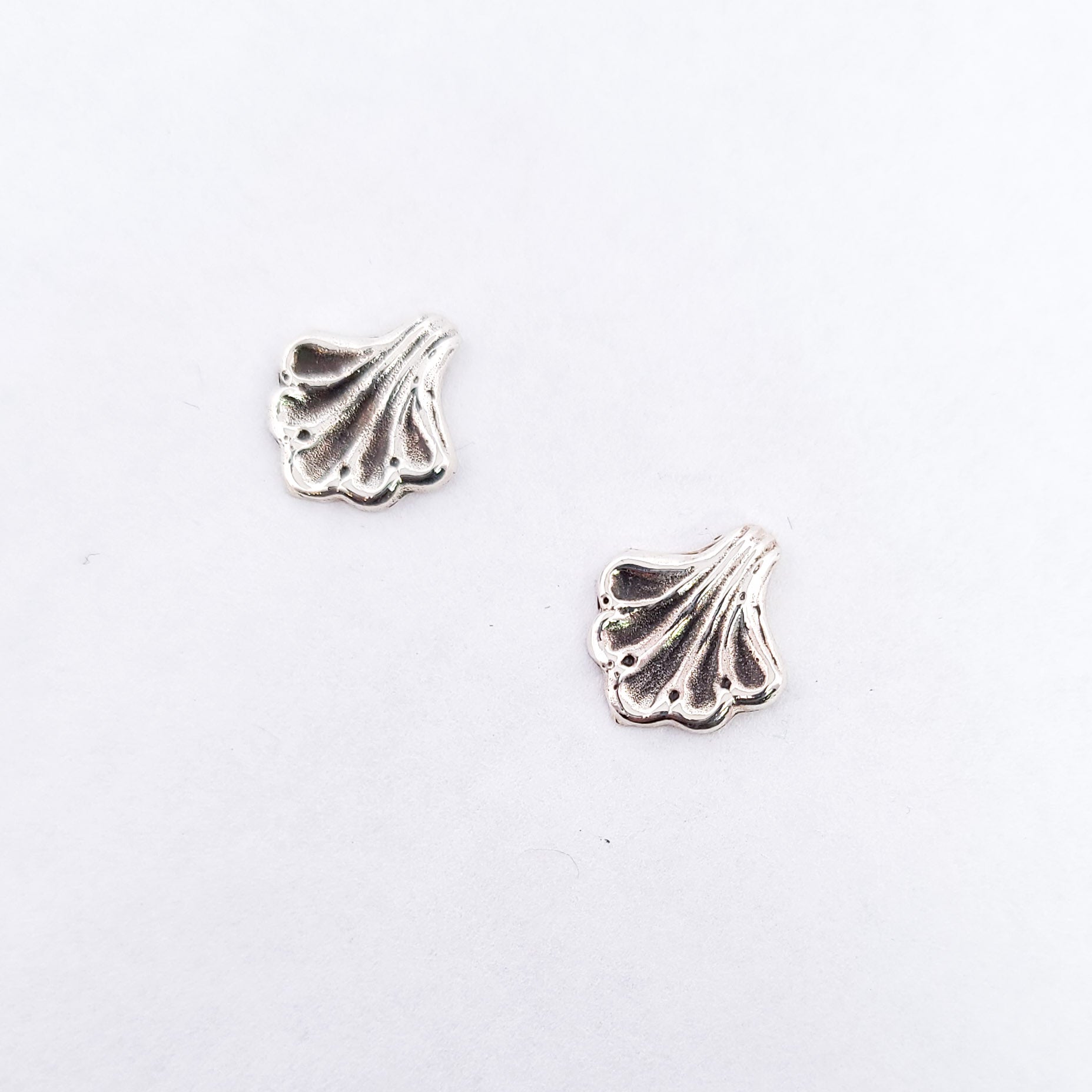 Collection of Baroque Shell Stud Earrings Silver in a gallery layout