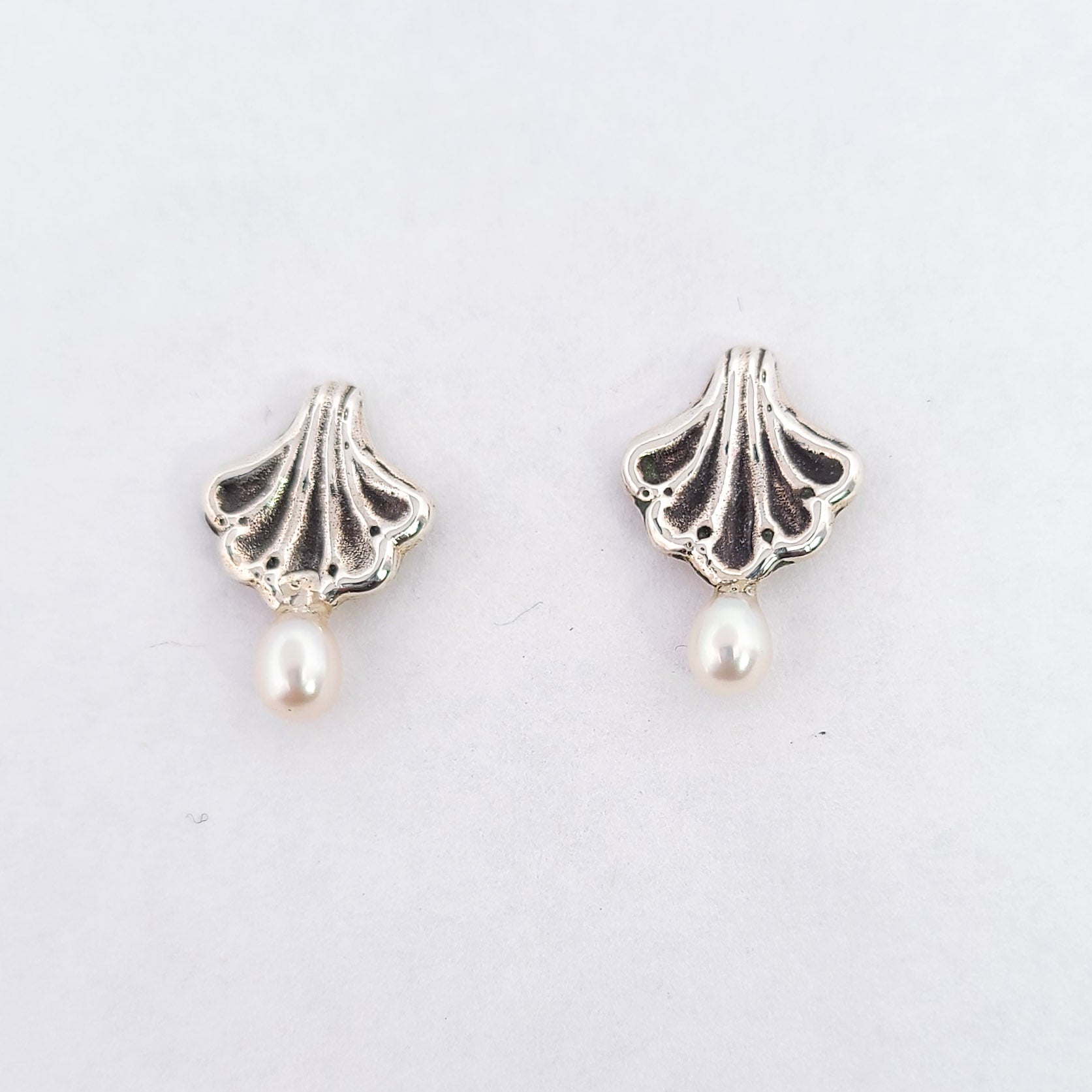 Collection of Minimal Small Baroque Shell Earrings With White Pearls in a gallery layout