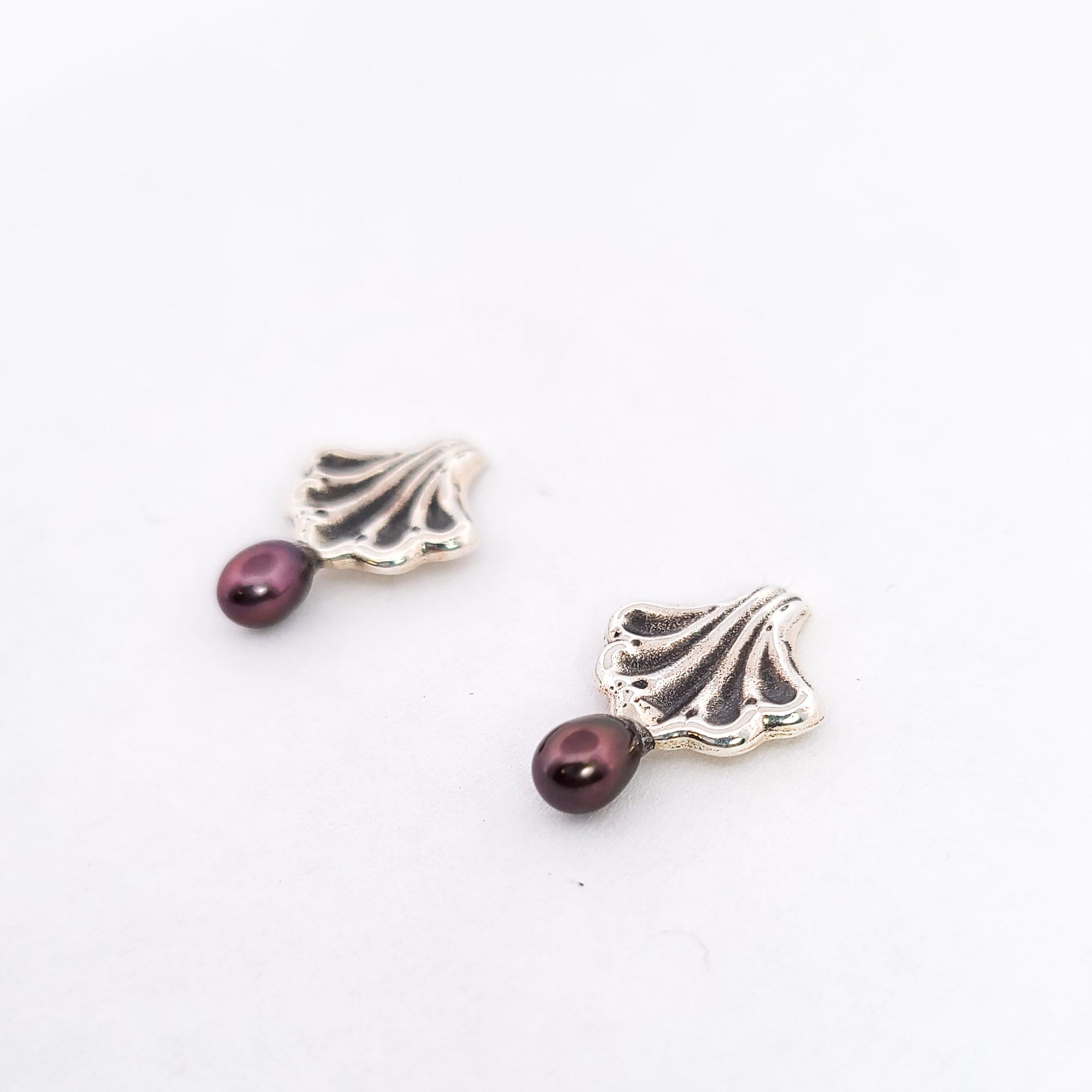 Ornate Seashell Earrings with Dark Pearls