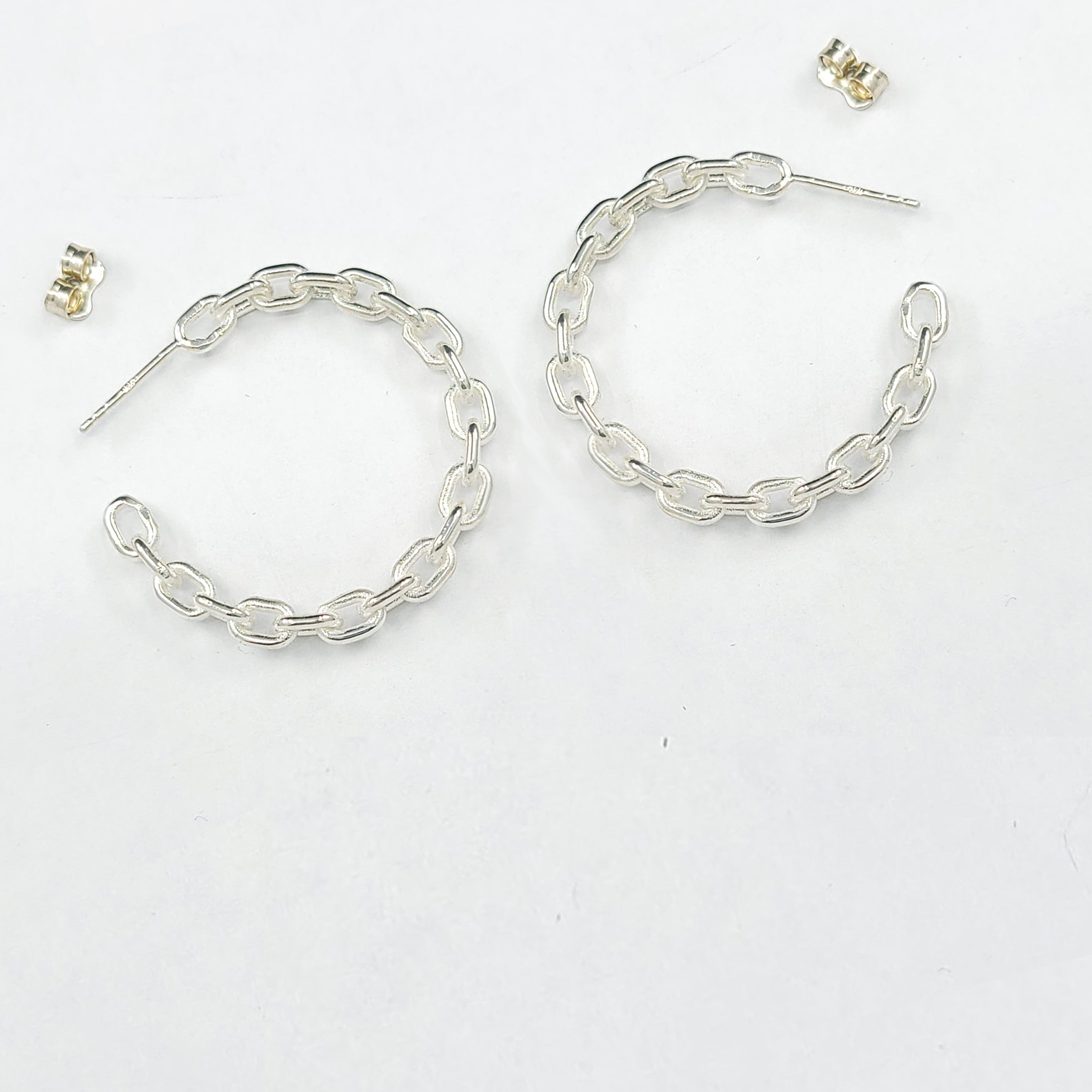 Collection of Sterling Silver Chain Hoops in a gallery layout