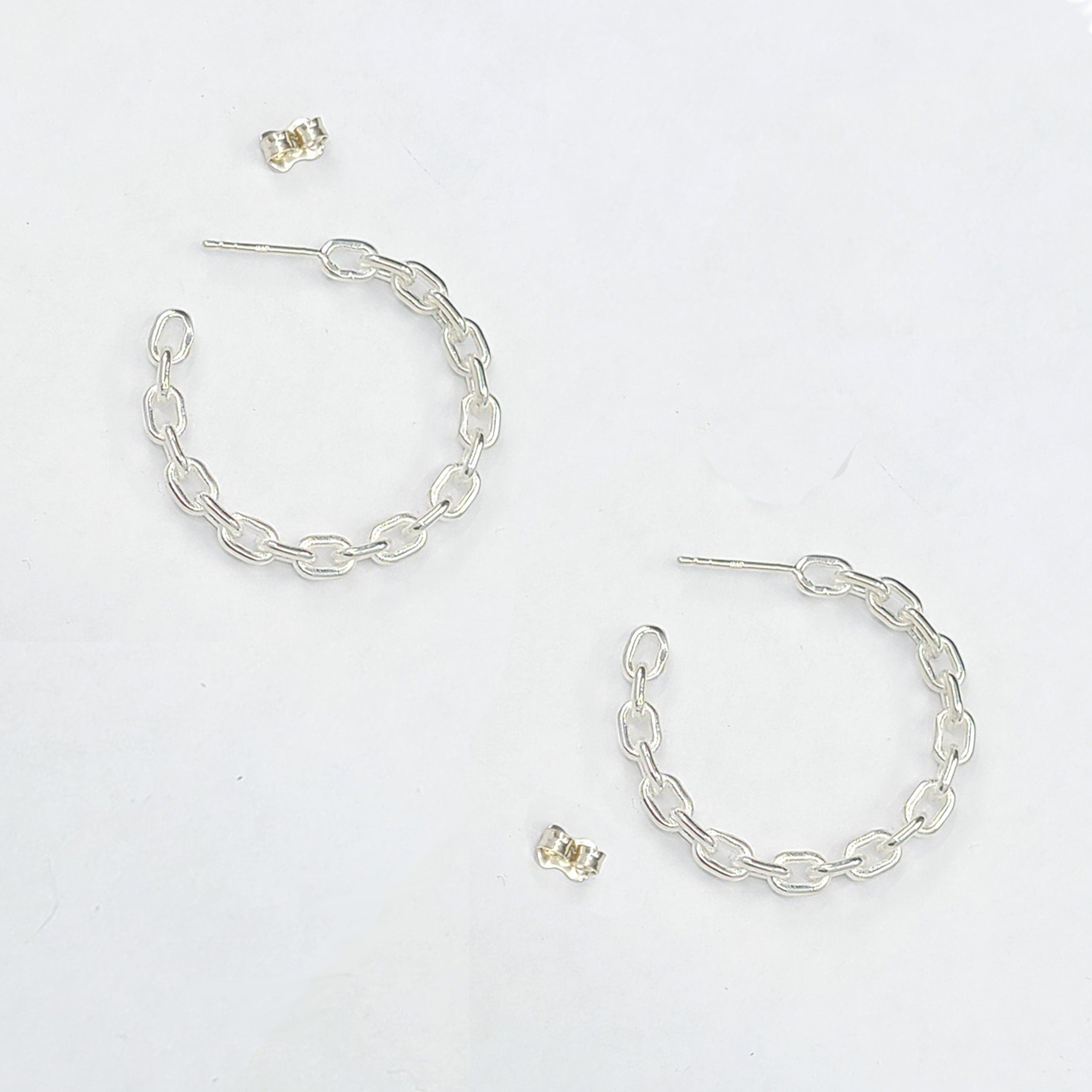 Collection of Sterling Silver Chain Hoops in a gallery layout