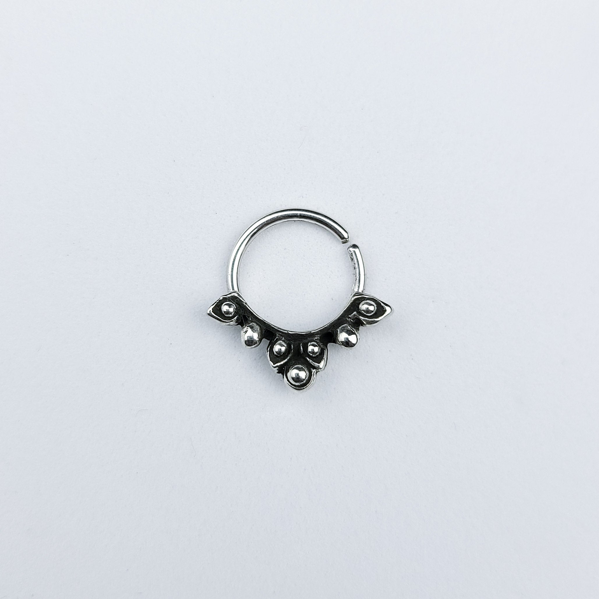 Collection of Silver Floral Septum in a gallery layout