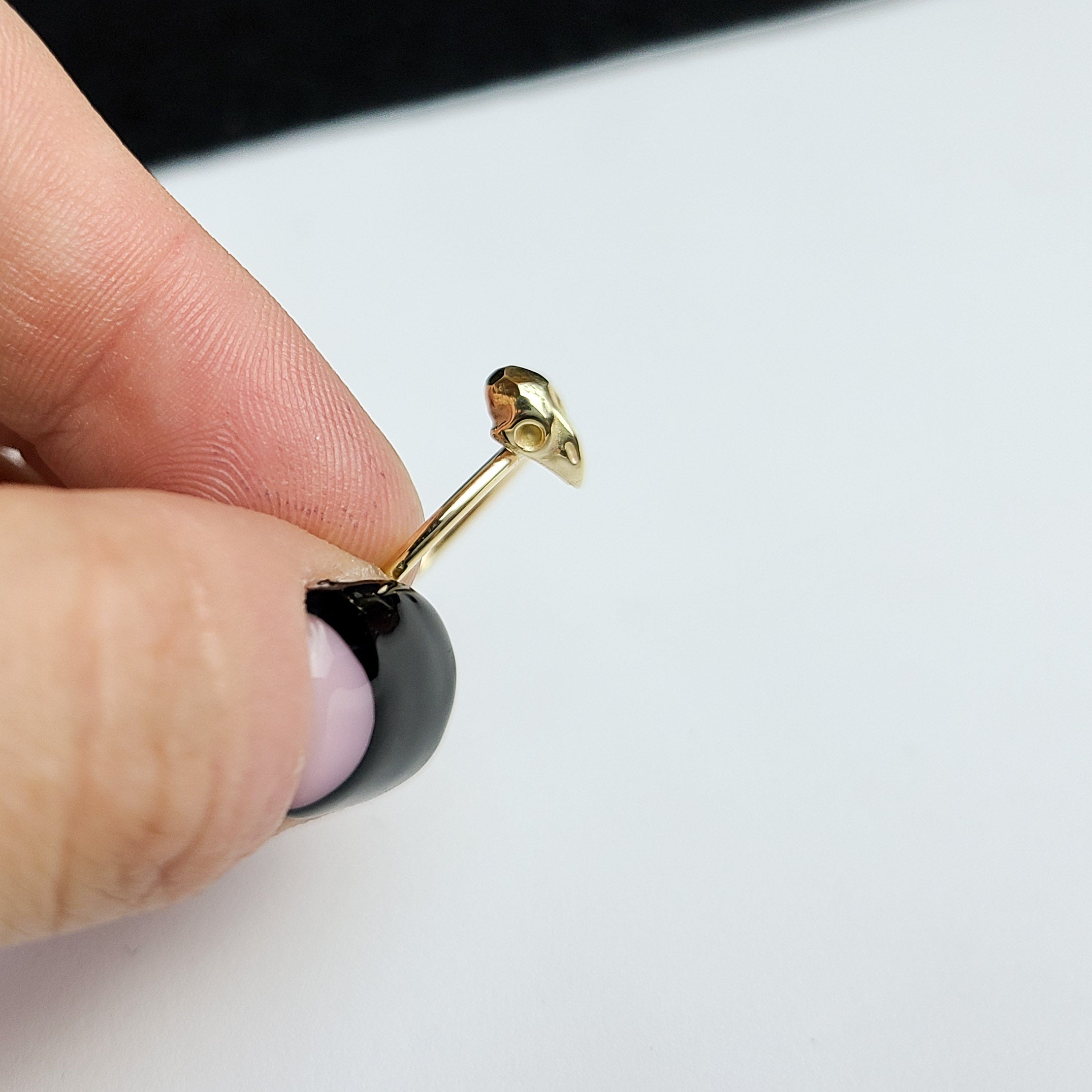 Collection of Yellow Gold Tiny Bird Skull Ring 10K - 14K in a gallery layout