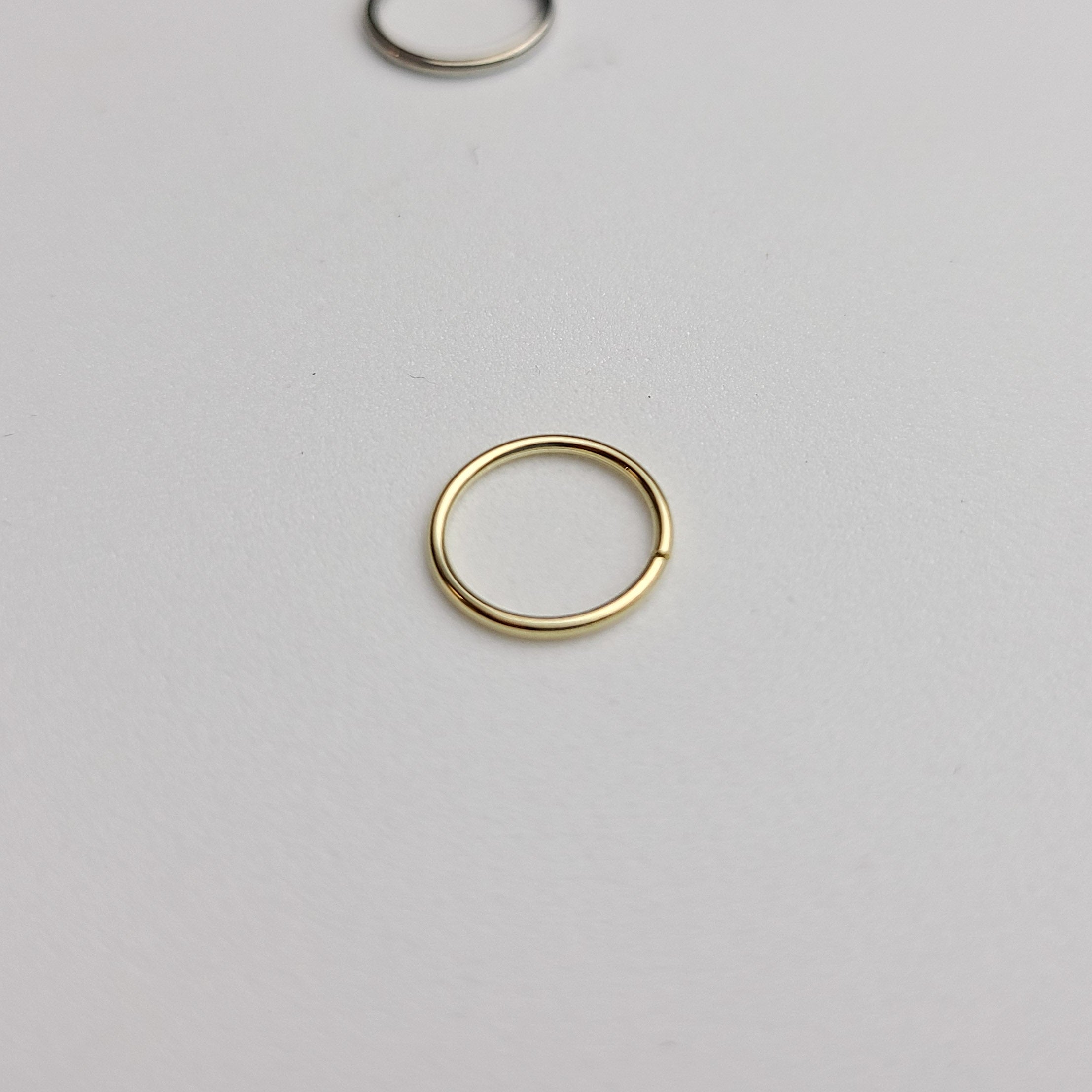 Collection of Yellow Gold Simple Septum Hoop 10K - 14K in a gallery layout