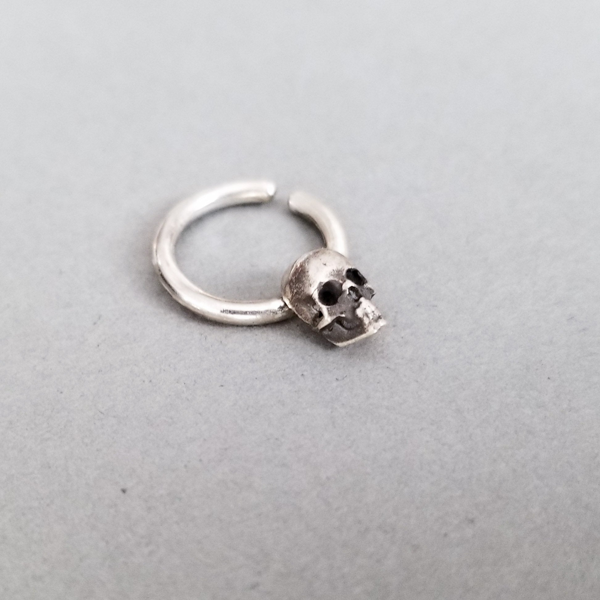 Collection of Minimal Skull Septum Ring - Inchoo Bijoux in a gallery layout