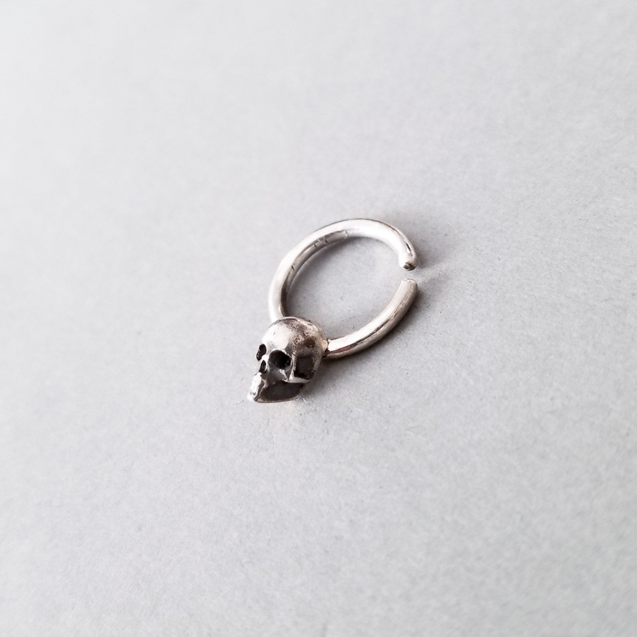 Collection of Minimal Skull Septum Ring - Inchoo Bijoux in a gallery layout