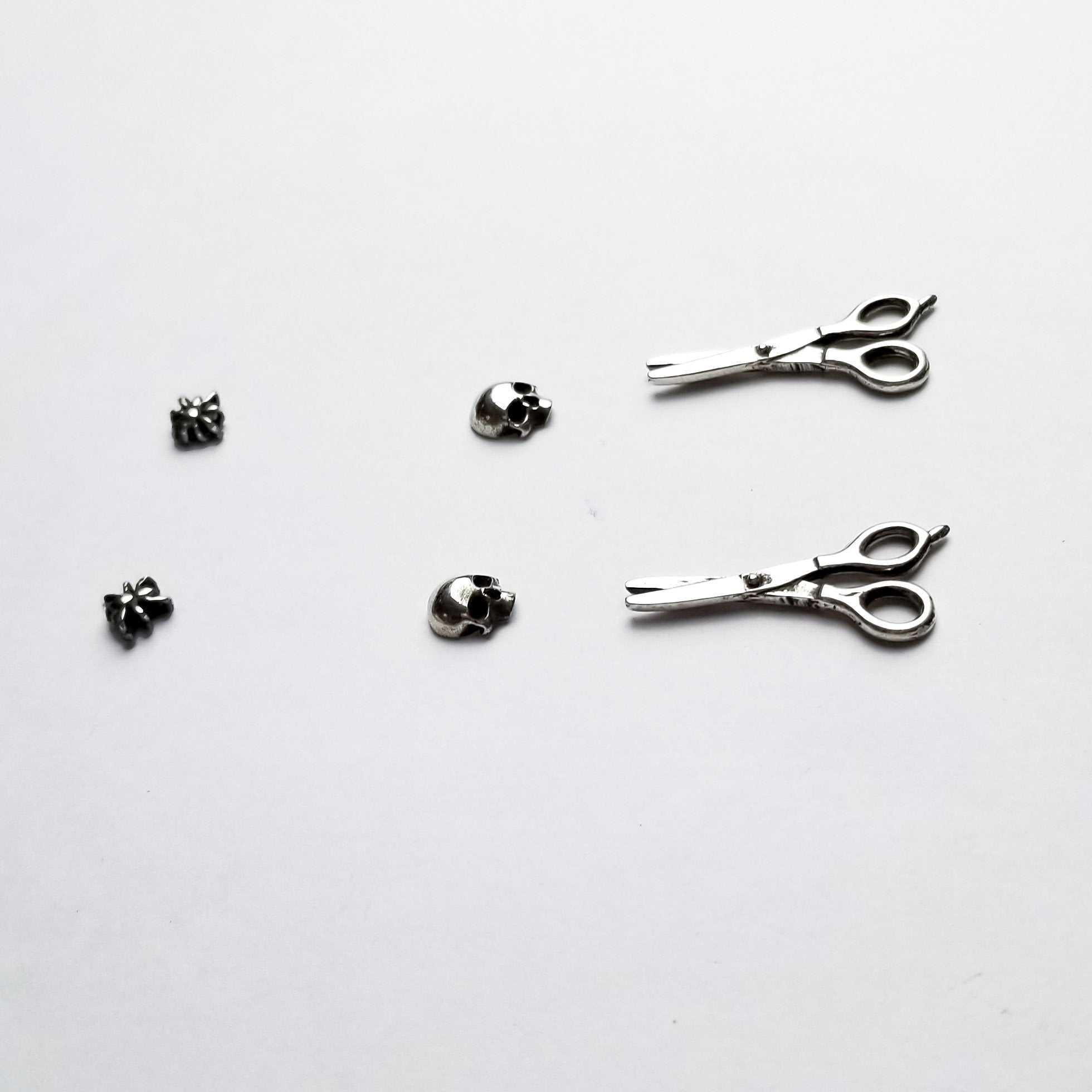 Collection of Set of 3 Pairs of Earrings #2 - Spider, Scissors & Skull Studs - Inchoo Bijoux in a gallery layout