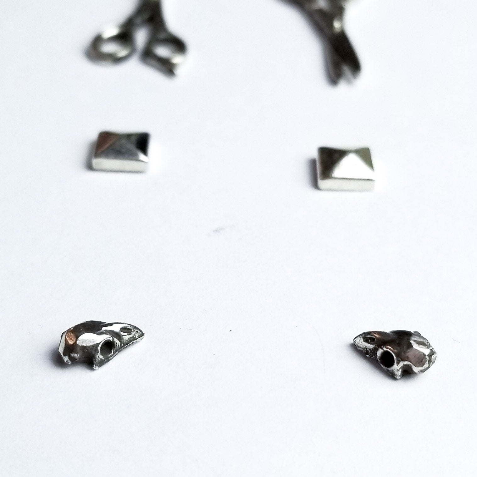 Collection of Set of 3 Pairs of Earrings #3 - Bird Skull, Scissors & Pyramid Studs - Inchoo Bijoux in a gallery layout