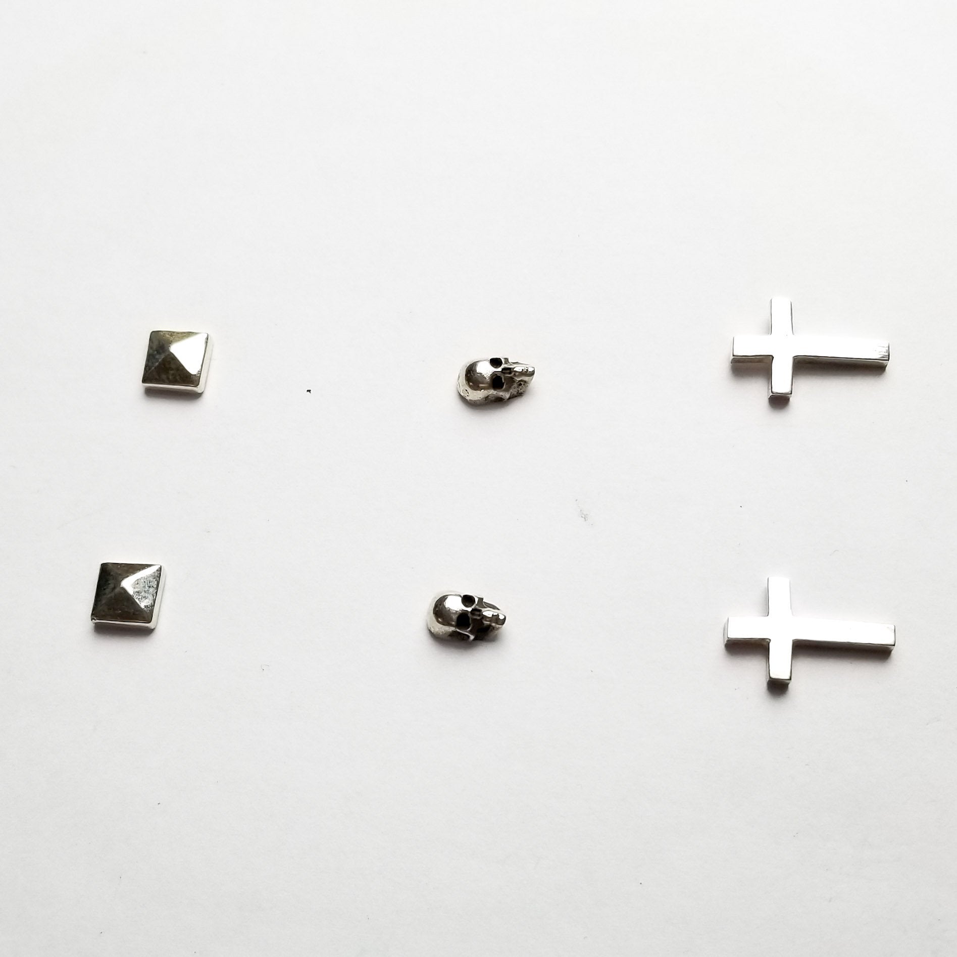 Collection of Set of 3 Pairs of Earrings #4 - Skull, Cross & Pyramid Studs - Inchoo Bijoux in a gallery layout