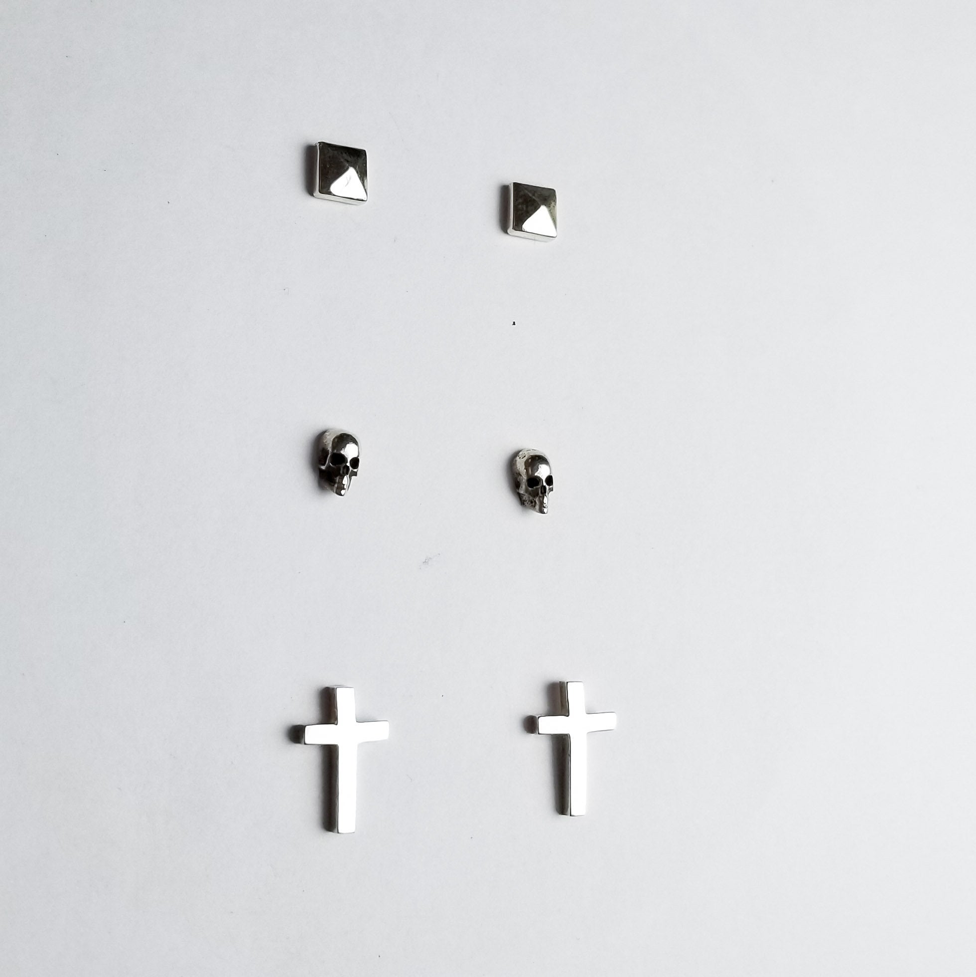 Collection of Set of 3 Pairs of Earrings #4 - Skull, Cross & Pyramid Studs - Inchoo Bijoux in a gallery layout