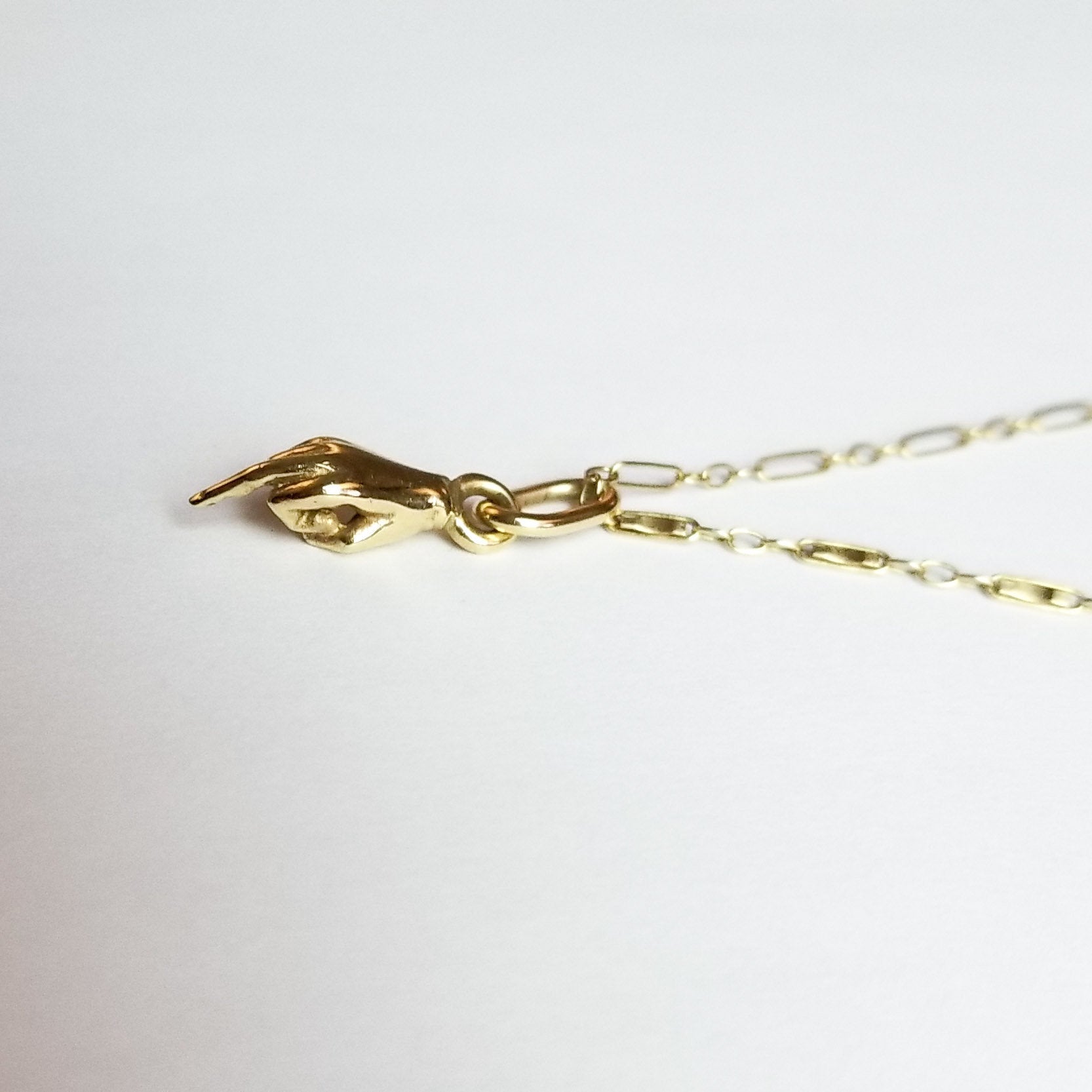 Collection of 10K - 14K Yellow Gold Middle Finger Pendant - Inchoo Bijoux in a gallery layout