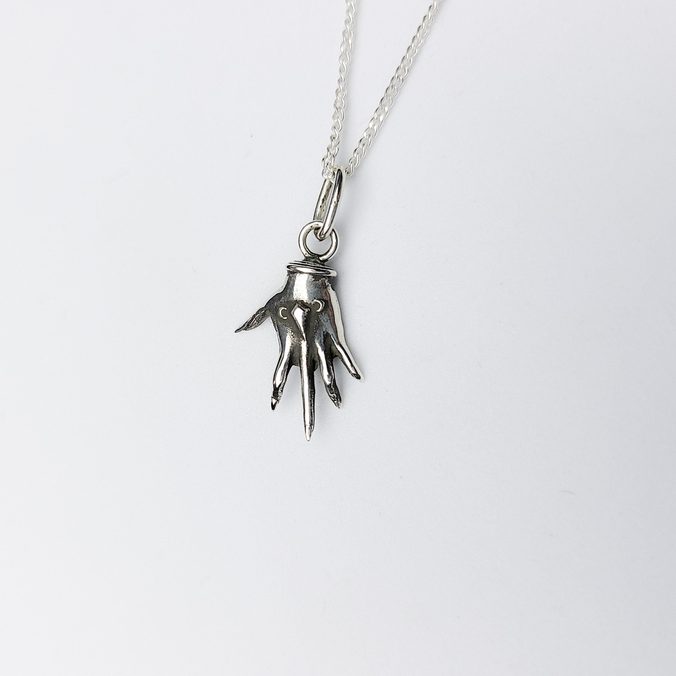 Collection of Small Silver Palmistry Hand Pendant in a gallery layout