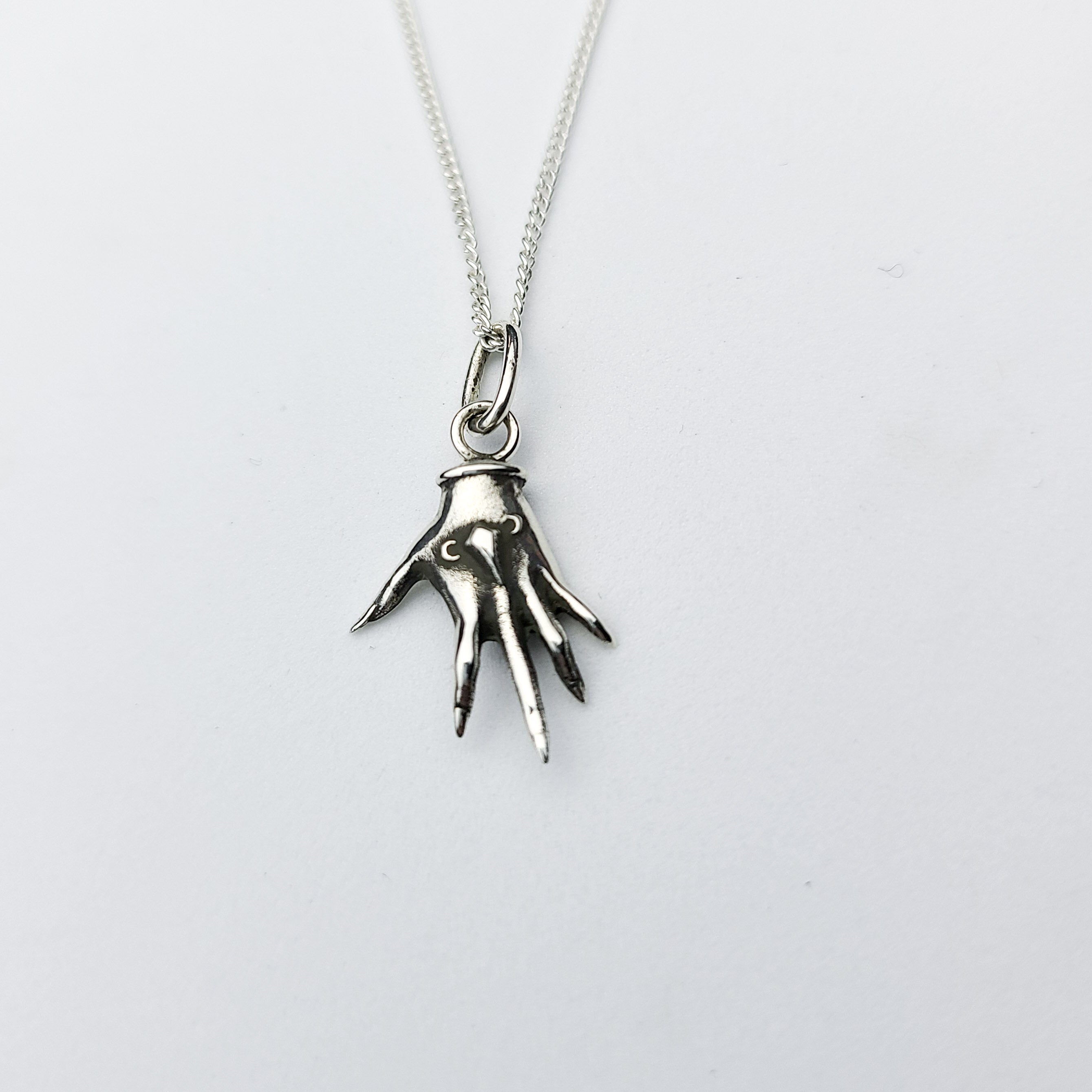 Collection of Small Silver Palmistry Hand Pendant in a gallery layout