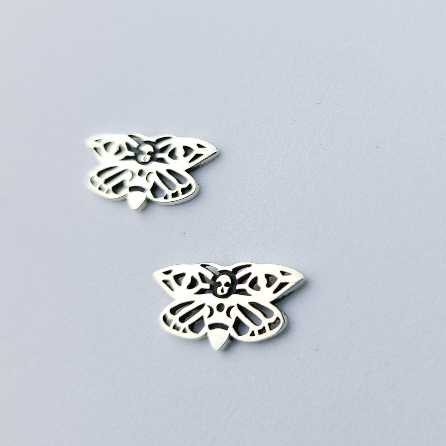 Collection of Small Moth Earrings in a gallery layout