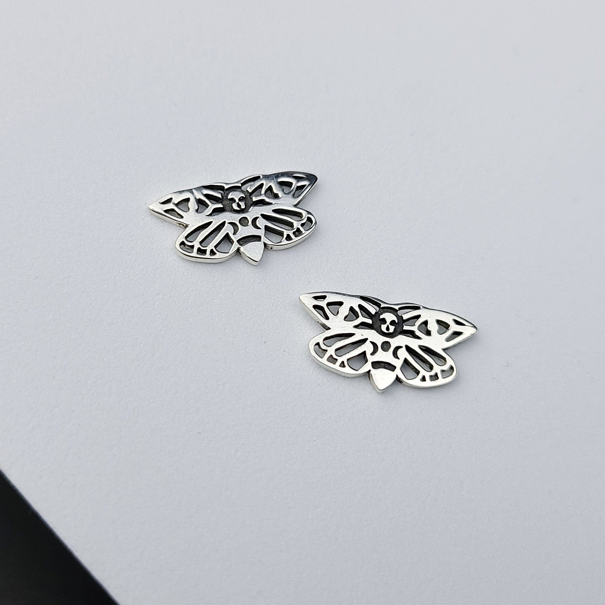 Collection of Small Moth Earrings in a gallery layout