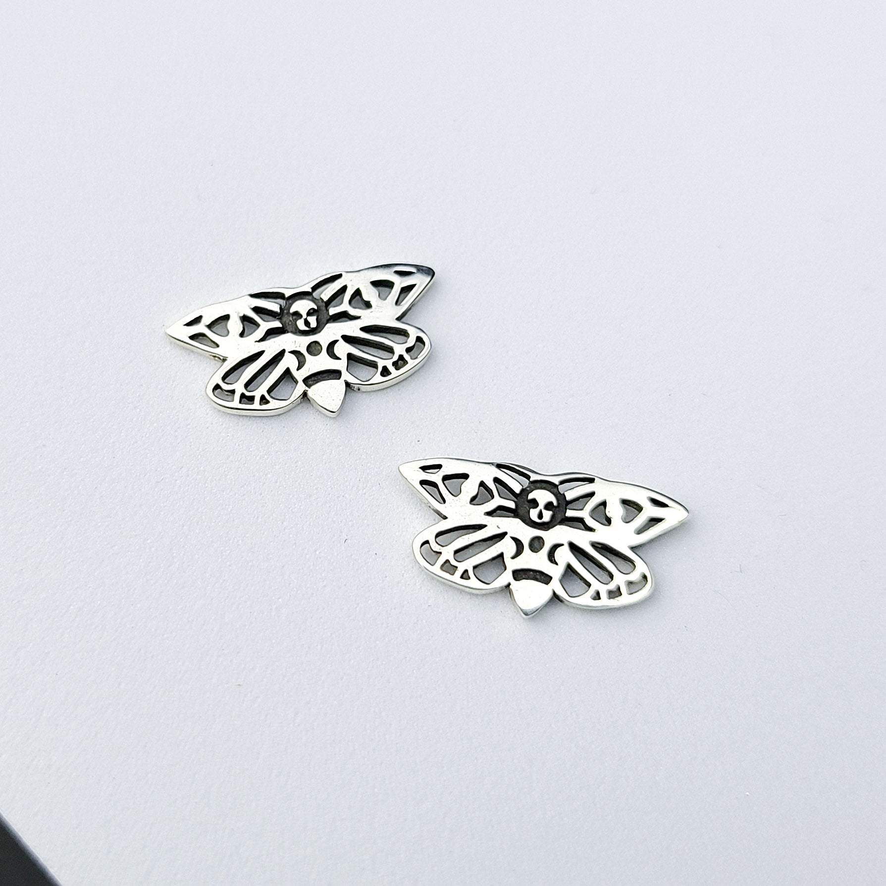 Collection of Small Moth Earrings in a gallery layout