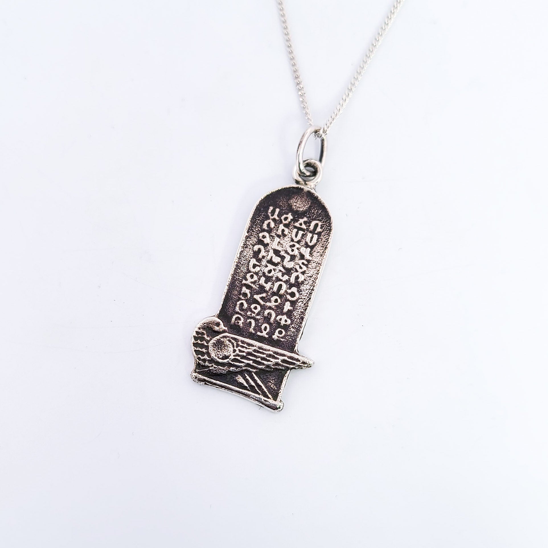 Collection of Silver Armenian Alphabet Tomb Pendant in a gallery layout