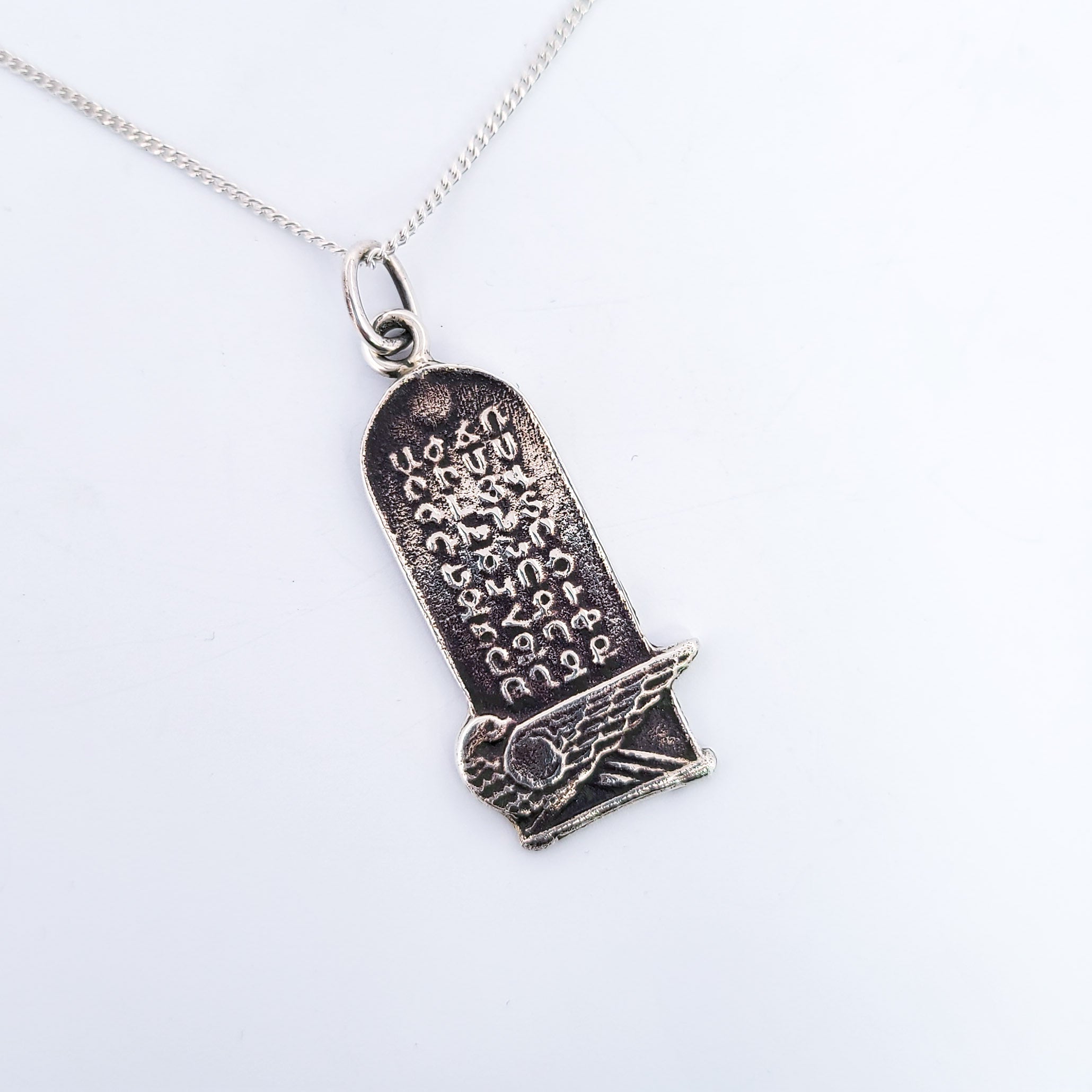 Collection of Silver Armenian Alphabet Tomb Pendant in a gallery layout